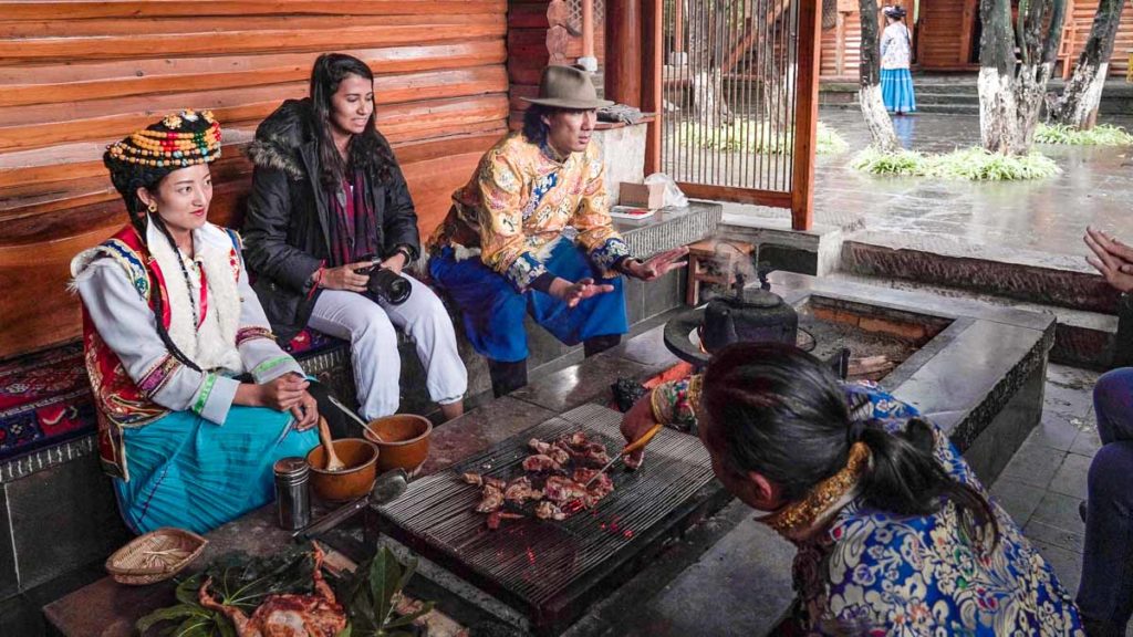 Interacting with the Pumi people in Yunnan Nationalities Village - China Things to do in Kunming city