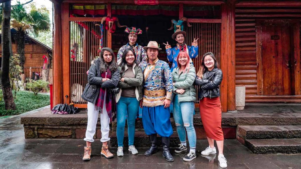 TTI Group photo with Pumi Tribe at Yunnan Nationalities Village - China Things to do in Kunming city