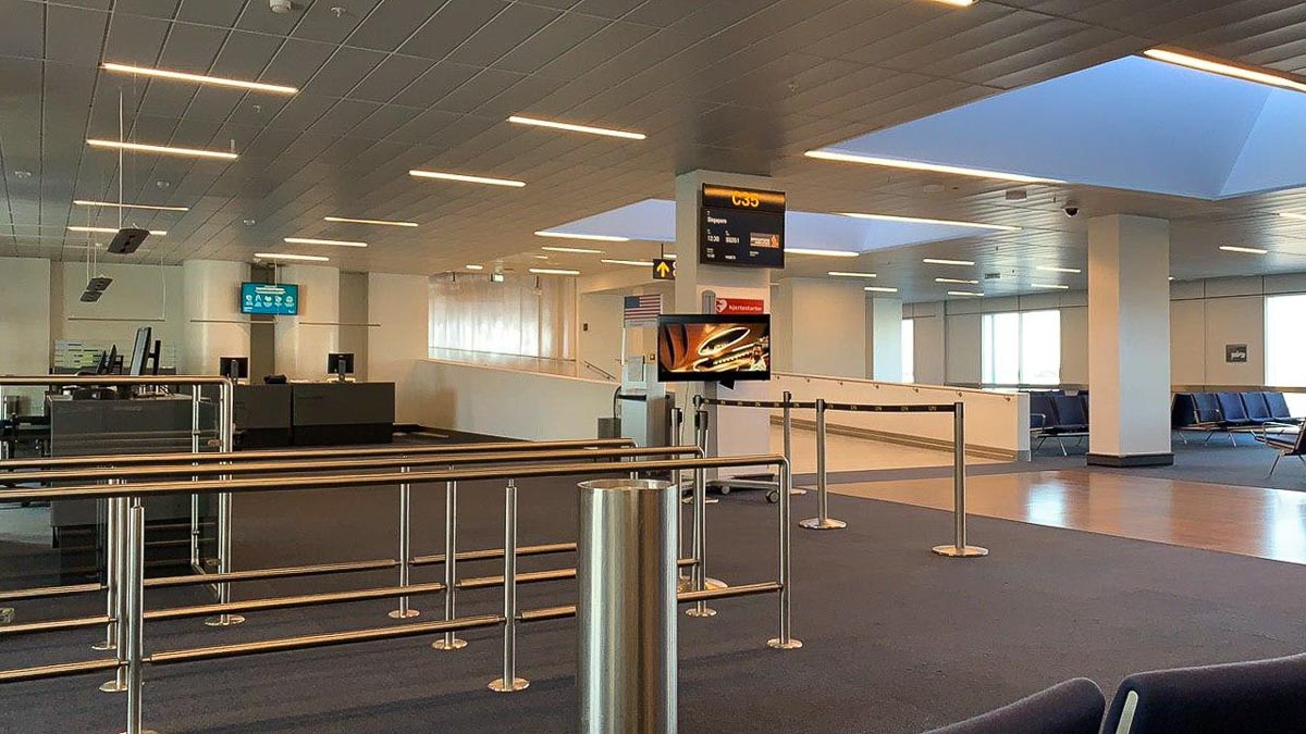 An empty airport during COVID-19 - Singaporean students coming home