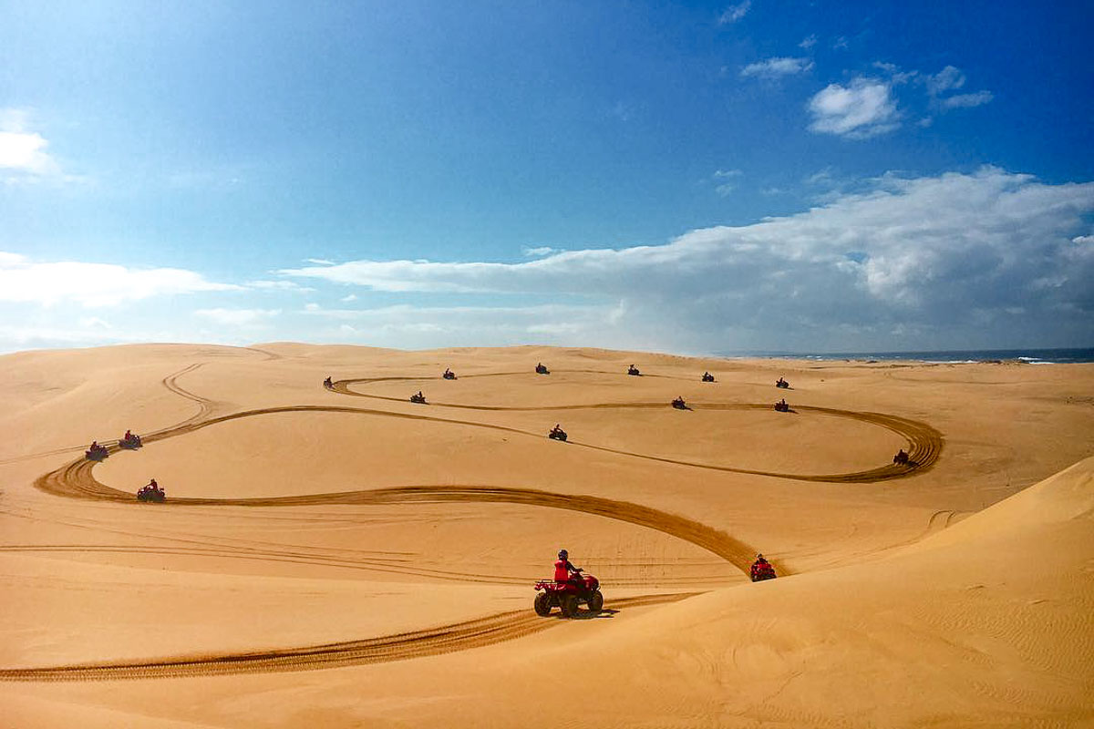 Group of People Quad Biking on Stockton Sand Dunes - Instagrammable New South Wales