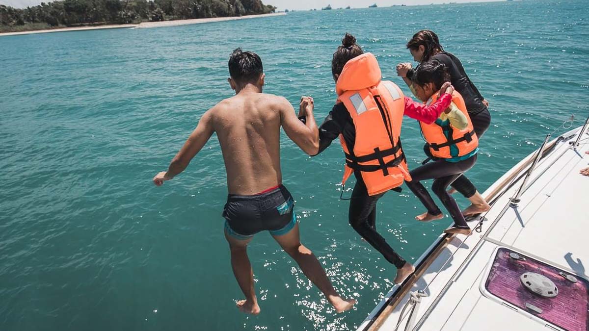 Jumping off a private yacht near Lazarus Island