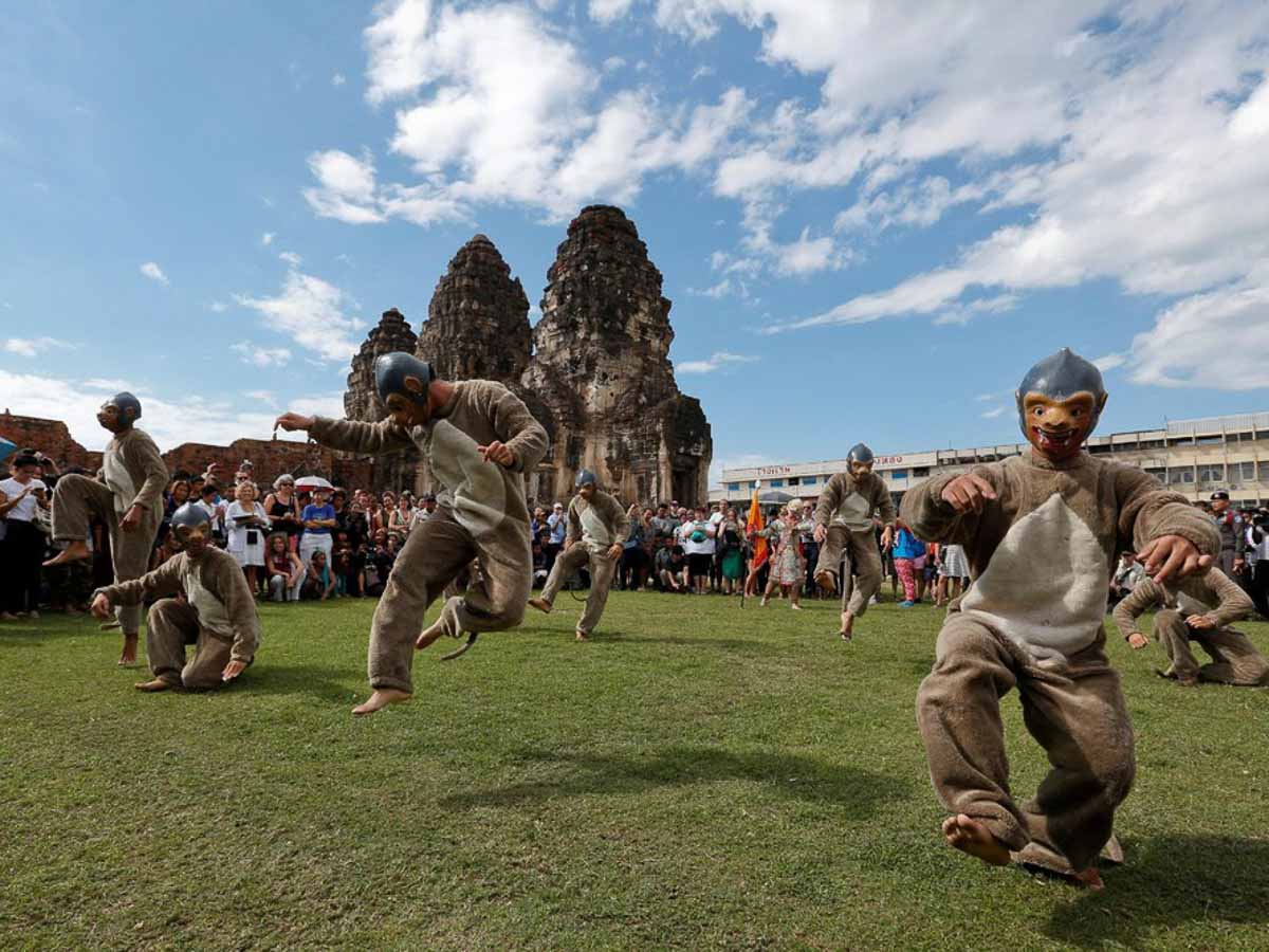 Locals Dressed as Monkeys Performing for Monkeys at the Lopburi Monkey Festival - Facts About The World 