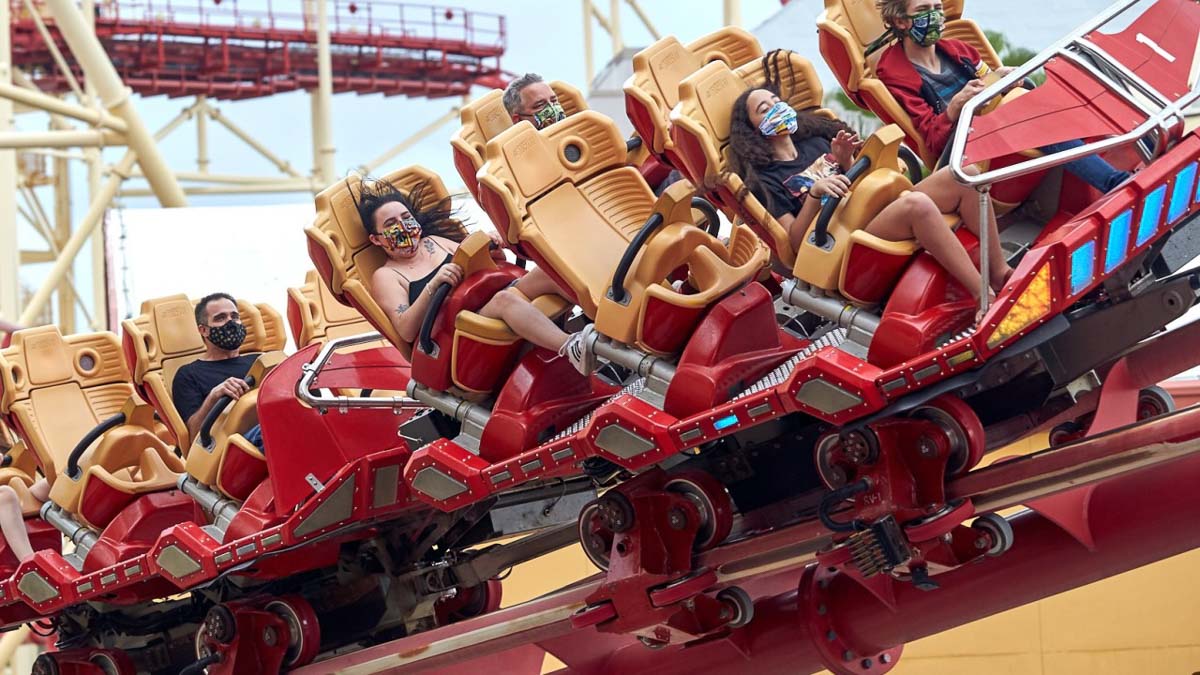 Universal Studios Orlando guests on rollercoaster in masks