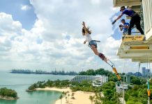 Girl Bungy Jumping AJ Heckett - Things to do in Singapore