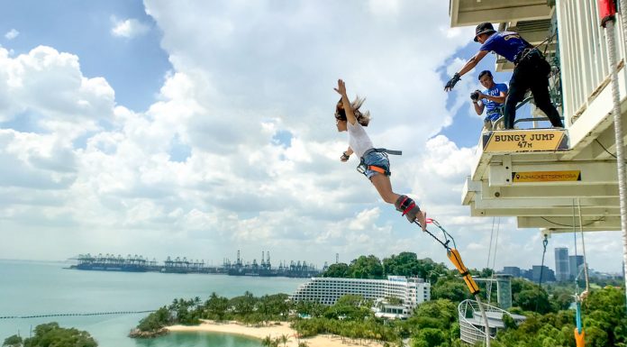 Girl Bungy Jumping AJ Heckett - Things to do in Singapore