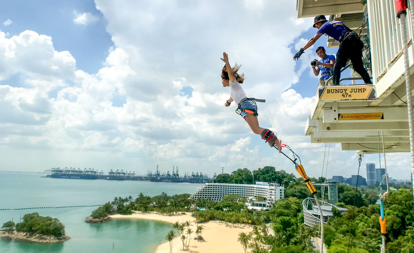 Girl Bungy Jumping AJ Heckett - Things to do in Singapore