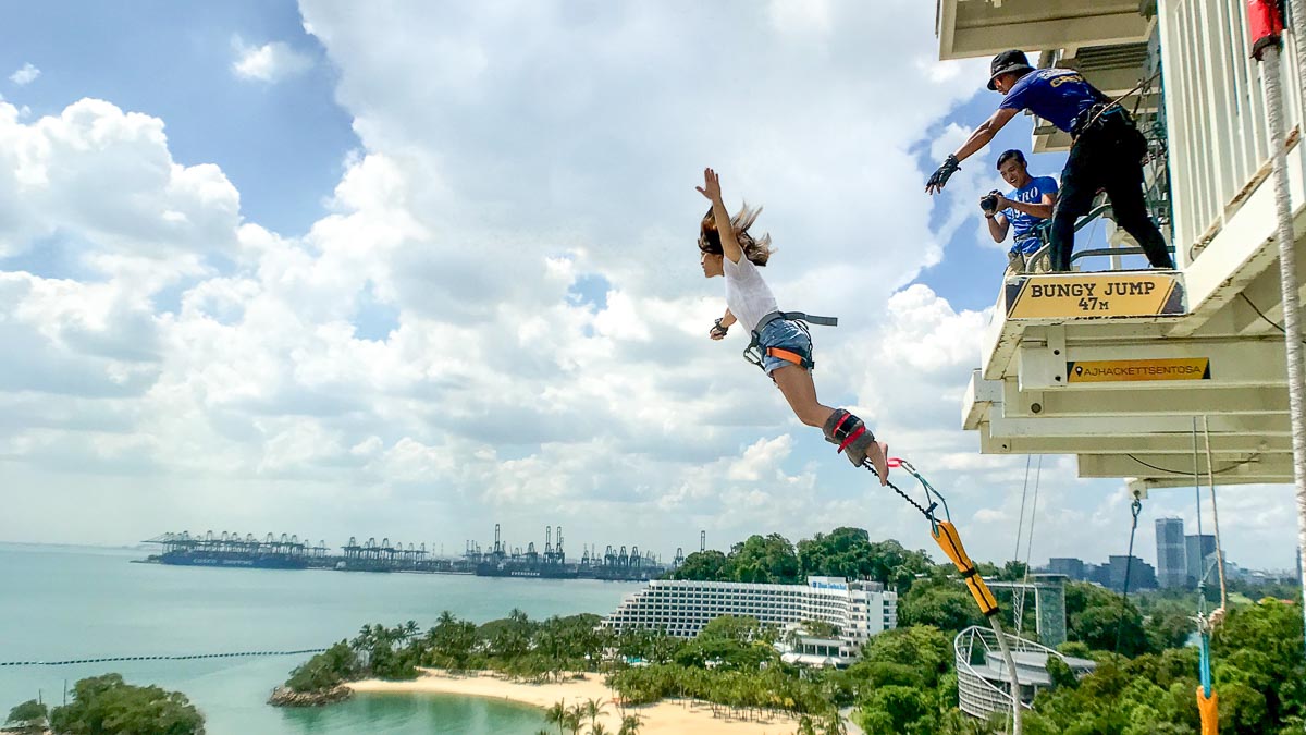 Girl Bungy Jumping at AJ Hackett Sentosa - Singapore Deals