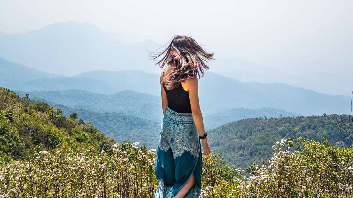 Girl Looking Out To The Mountains