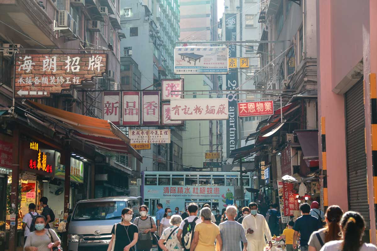 People Wearing Masks on Hong Kong Streets - Singapore Hong Kong Travel Bubble