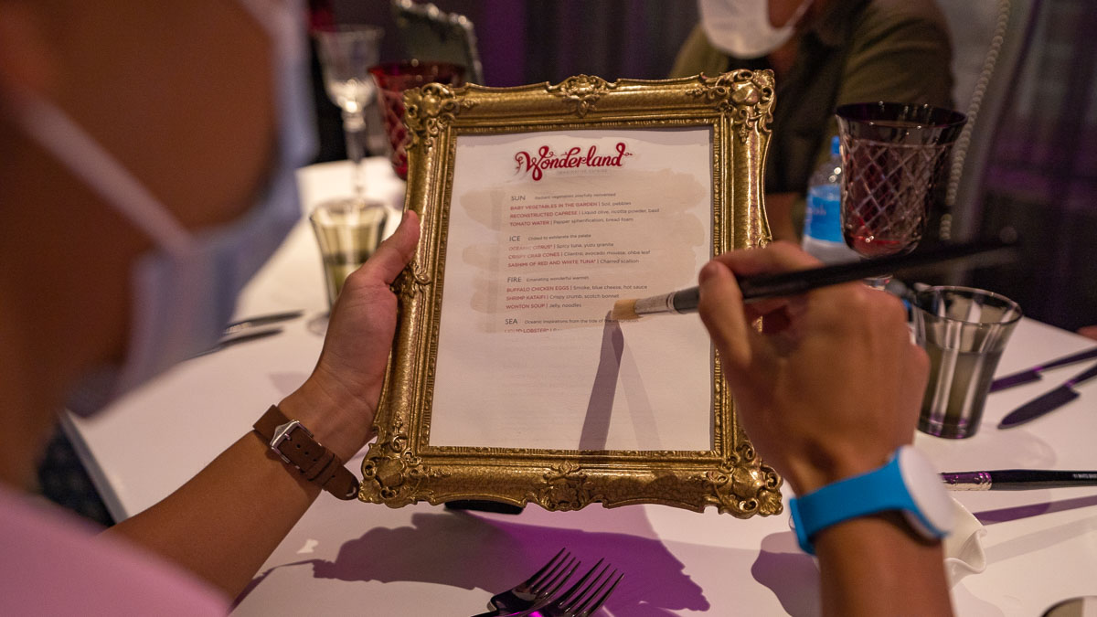 Wonderland Painting the Menu - Cruise to Nowhere Review