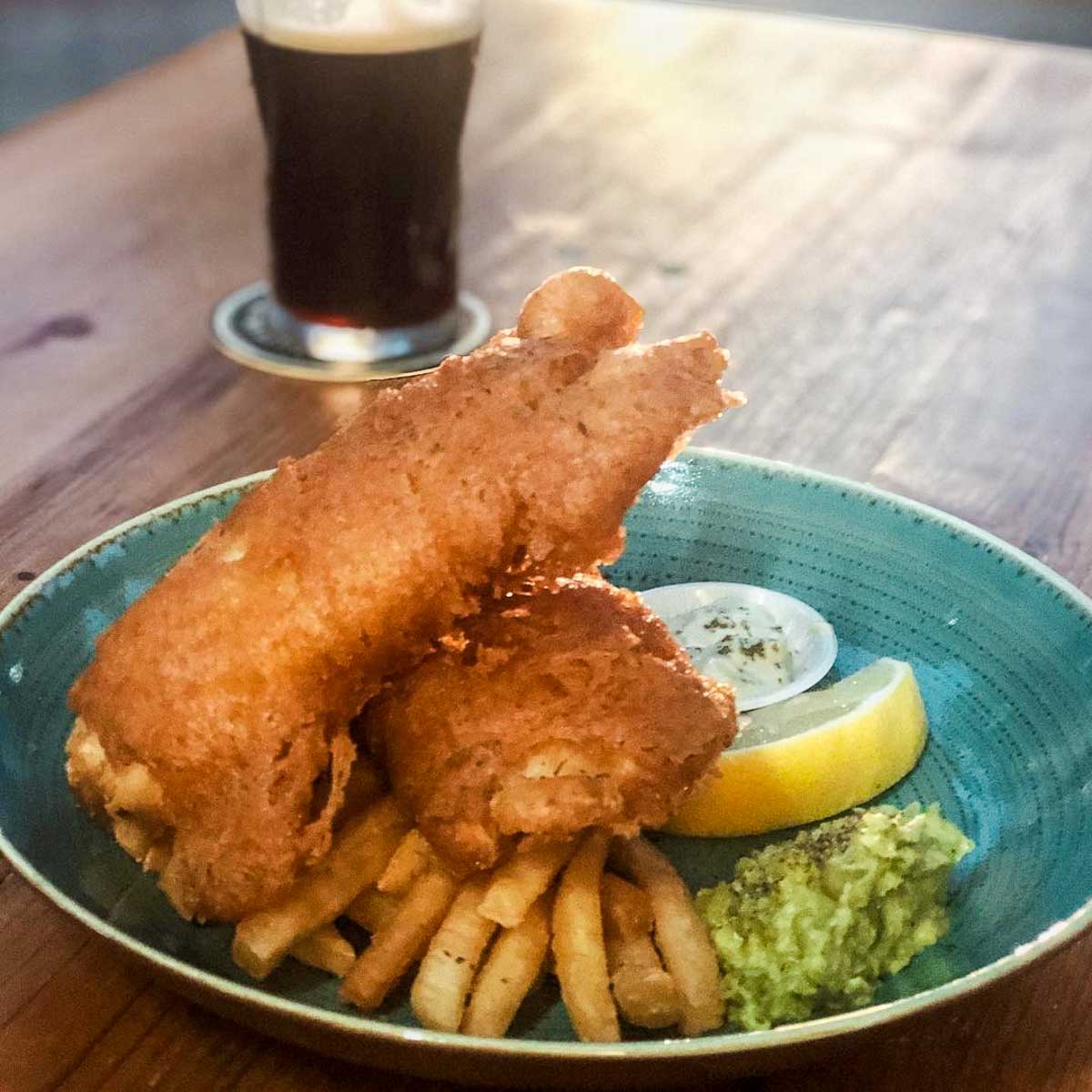 Lad and Dad Fish & Chips with a Pint of Beer