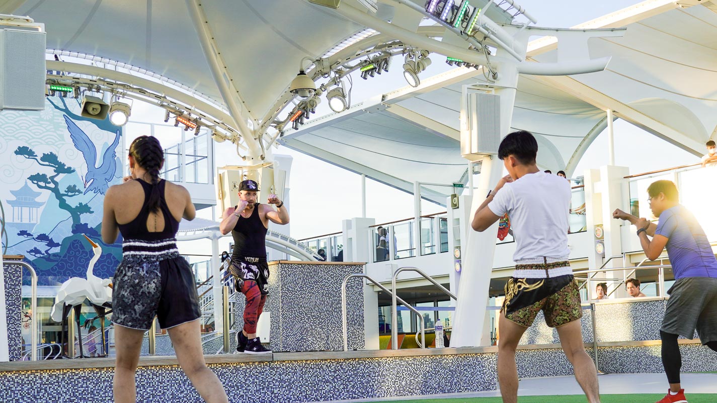 Learning muay thai from a professional - Dream Cruise Thailand Edition