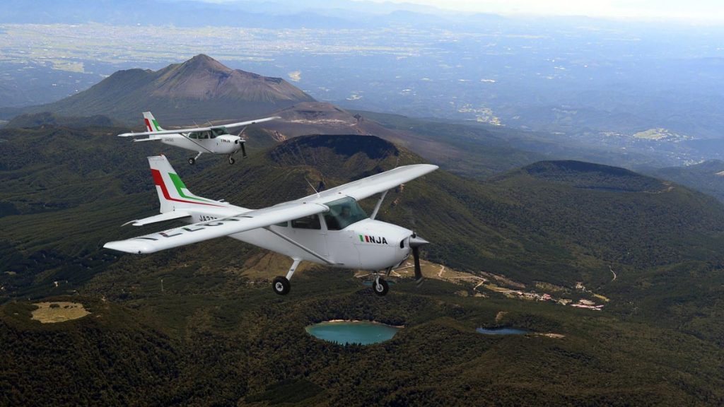 Passenger Plane Flight Over Kirishima Mountains - Japan National Parks