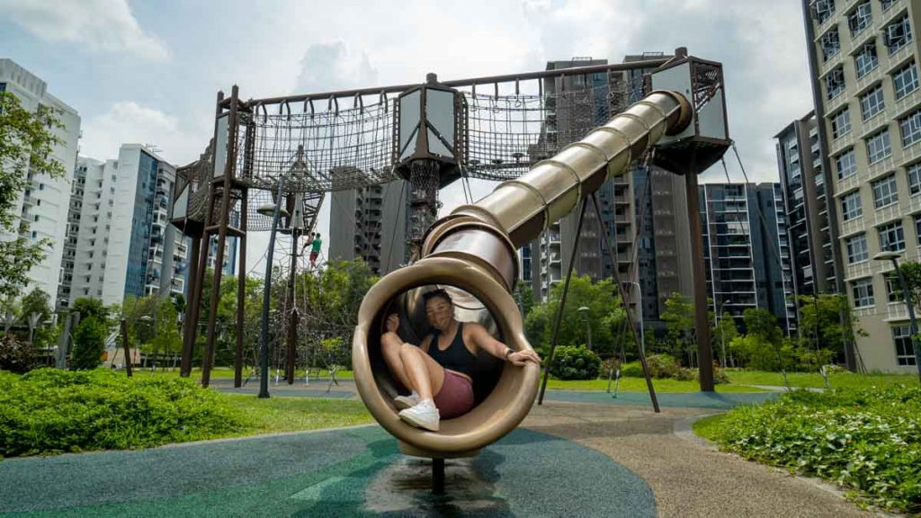 Girl on Slide at Tampines Green Forest Park — Outdoor Playgrounds in Singapore
