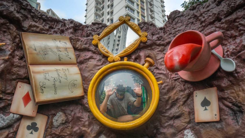 Boy Looking out Window at The Wonderland Playground in Singapore