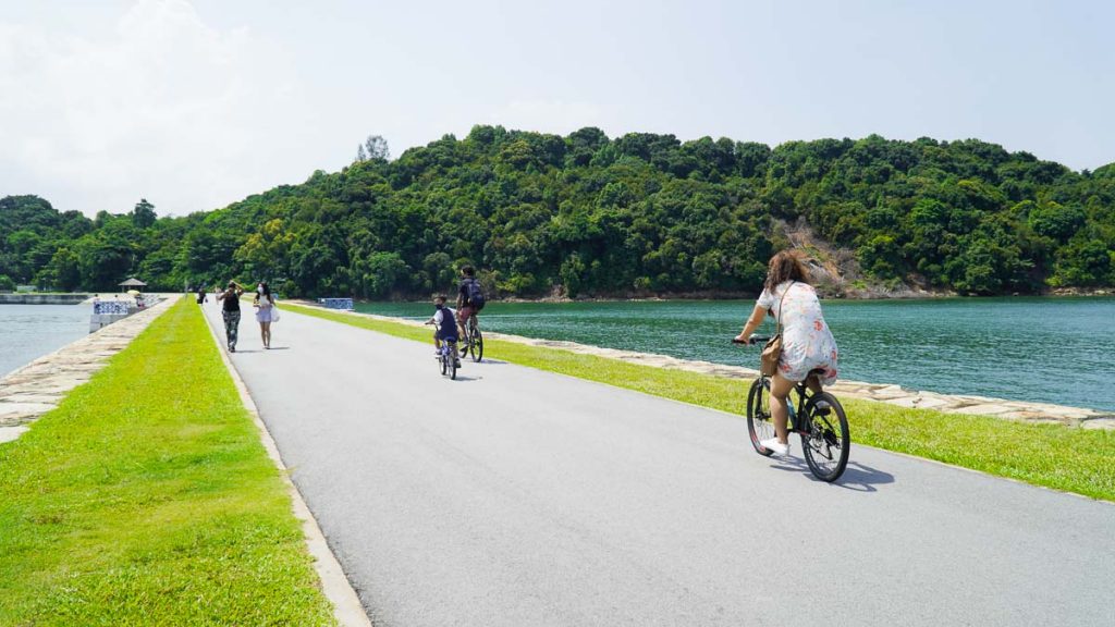Cycling at on Causeway bridge between Lazarus and St John's Island – Southern Islands