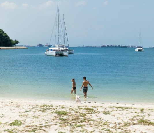 Couple walking on the beach – Lazarus Island