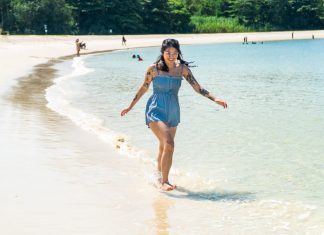 St. John’s Island and Lazarus Island Guide — 11 Fun Things to do on Singapore’s Southern Islands Girl frolicking in the waters Lazarus Beach - St. John's Island and Lazarus Island