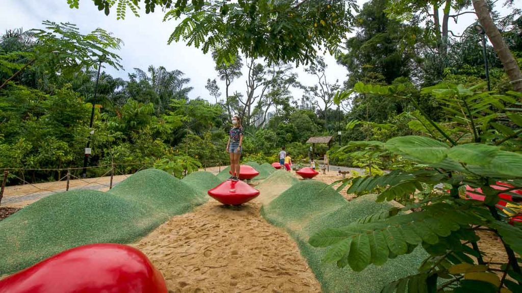 Girl Standing on Gigantic Saga Seed at COMO Adventure Grove 
