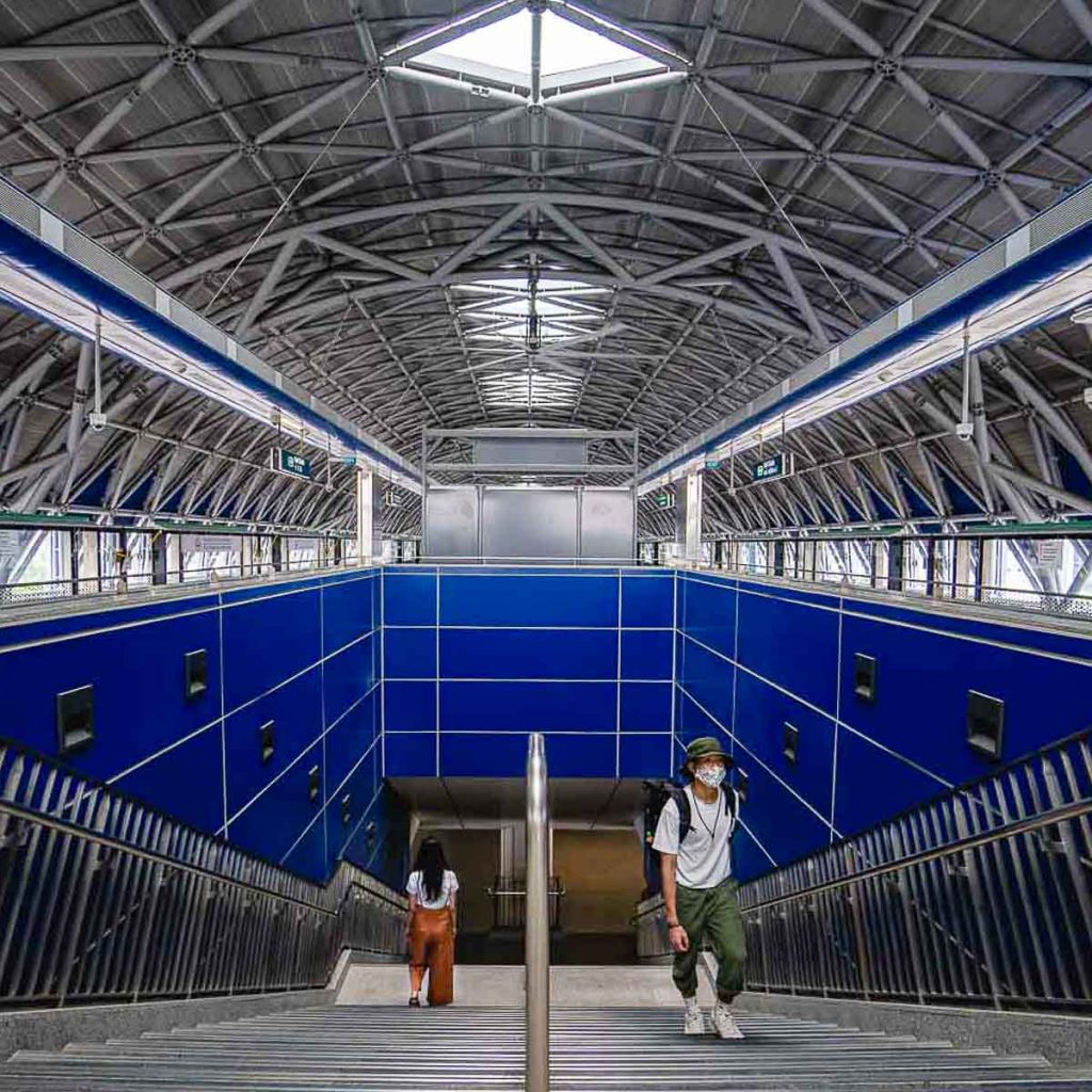 Couple on Stairs at Gul Circle Singapore MRT Station