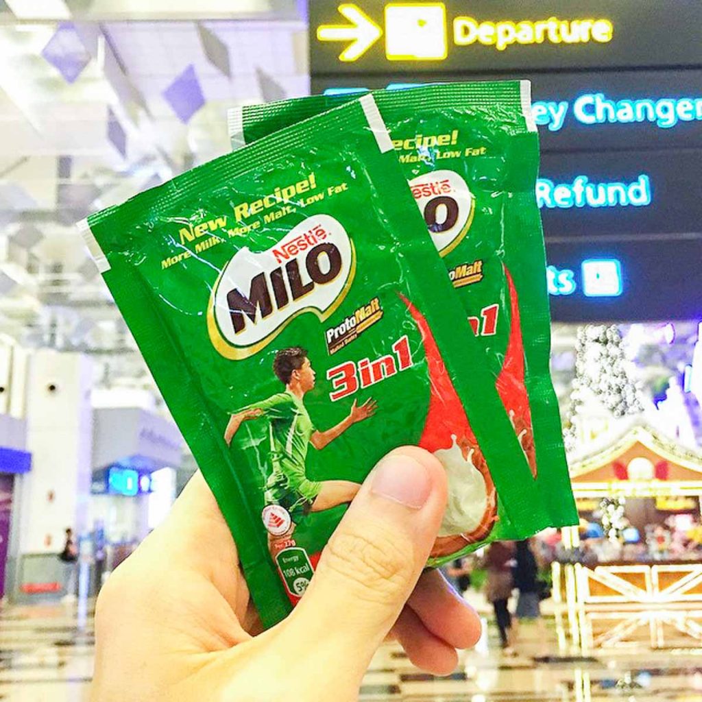 Hand Holding 3-in-1 Milo Sachet Singaporean Overseas