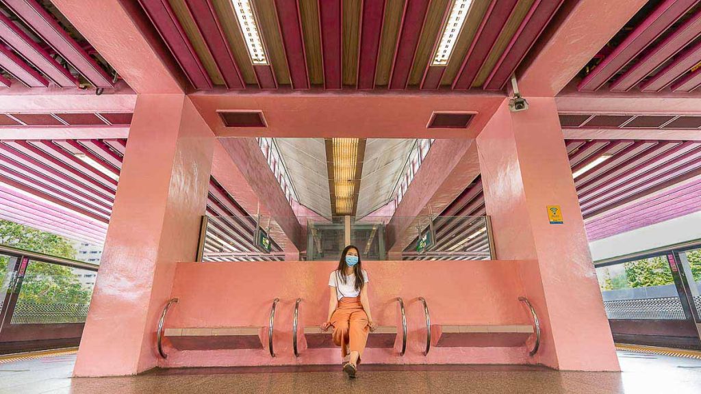 Girl Seated on Chair at Redhill Singapore MRT Station