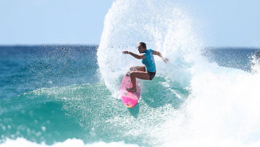 Girl Surfing — Olympic Sports to try in Singapore