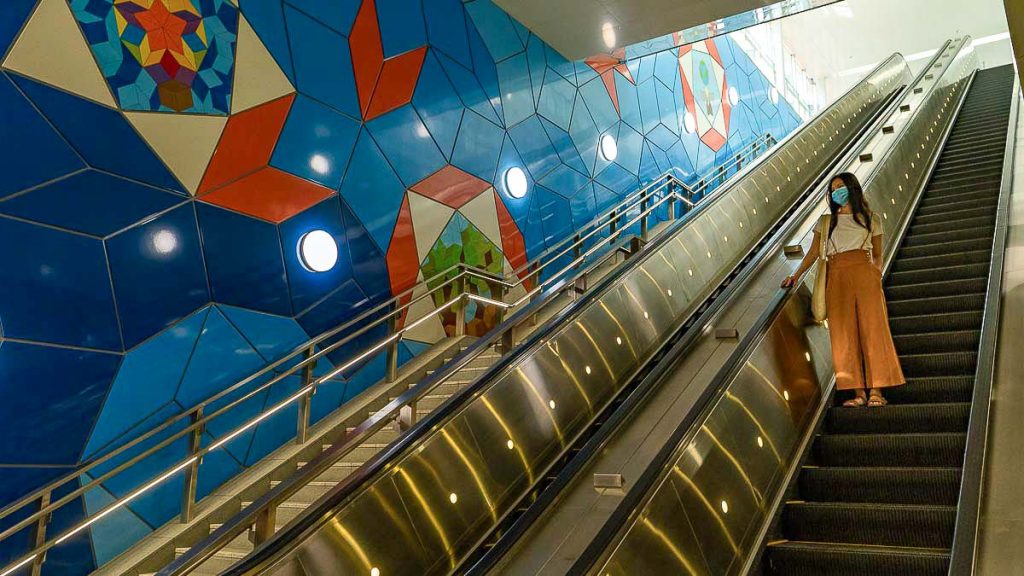 Girl on Escalator at Woodlands South Station