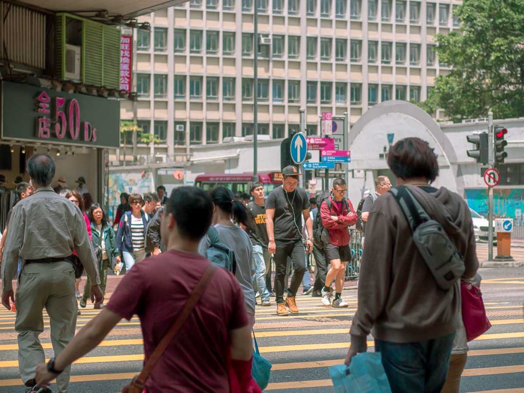 People crossing traffic in Hong Kong - Hong Kong Cultures Explained