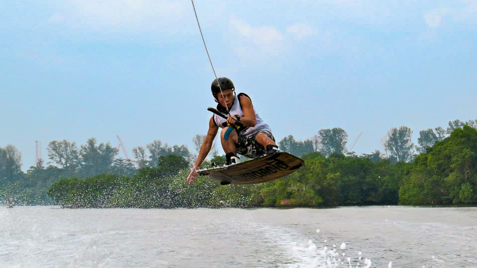 Boy wakesurfing in Sembawang 