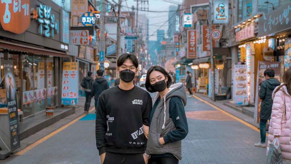 Seoul street couple with mask on - Singapore Korea VTL