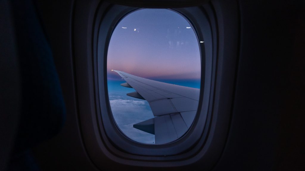Airplane Window View - Miles Hacking