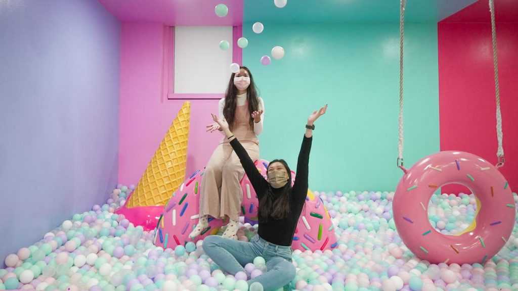 Girls Playing in Colorpool Museum Ball Pit Singapore South Korea VTL Itinerary