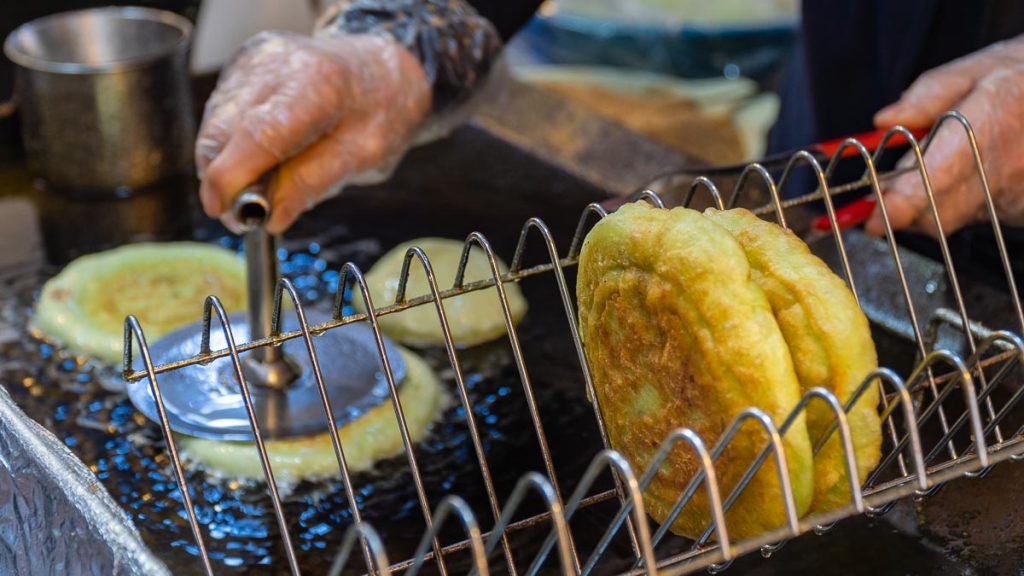 Woman Making Jeon - Things to eat in Seoul