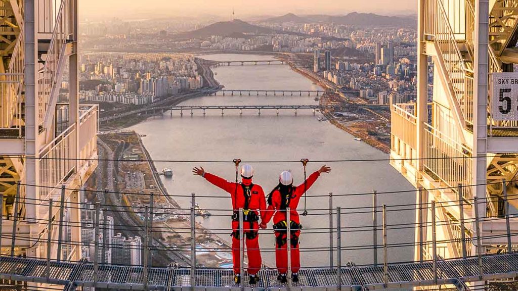 Couple Standing on Sky Bridge