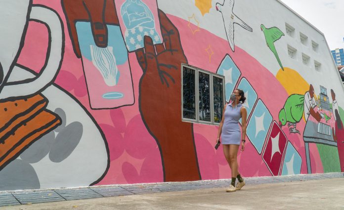 Girl-Posing-along-Graffiti-at-Desker-Road-Jalan-Besar-1-2