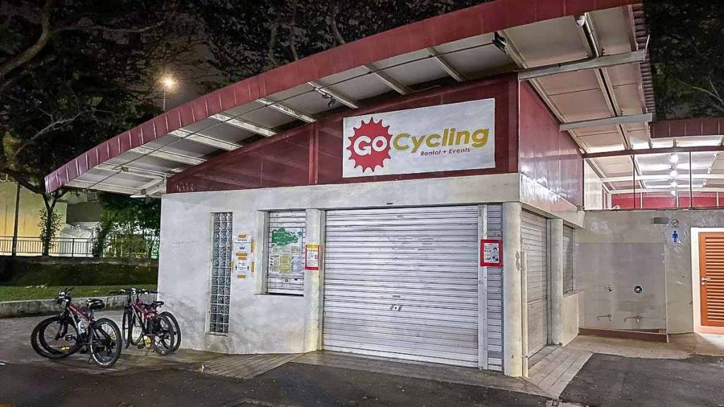 Closed bicycle kiosk with parked bicycles - Night Cycling Singapore