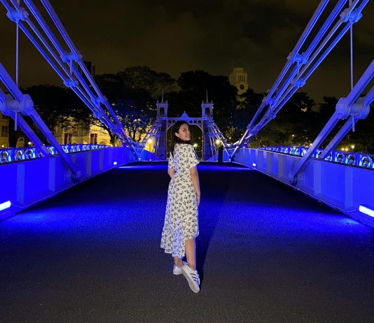 Girl on bridge - iPhone night photography