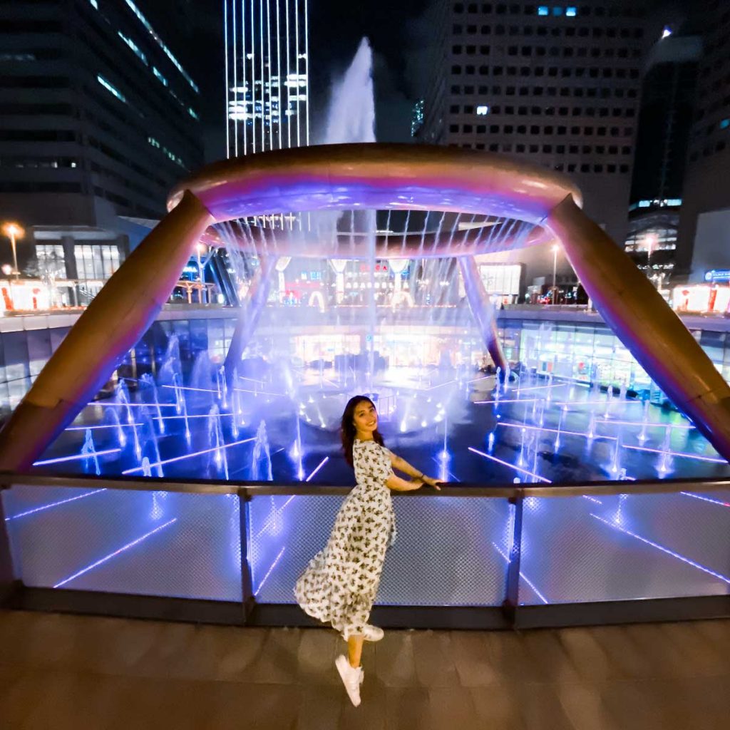 Girl posing at Fountain of Wealth