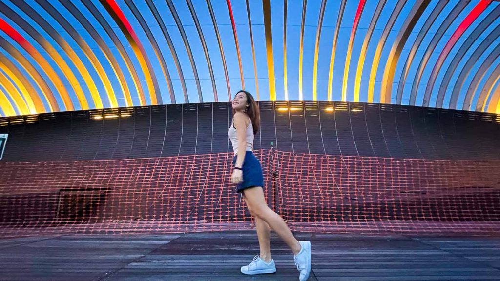 Girl walking on Henderson Waves Bridge - Instagrammable spots in Singapore
