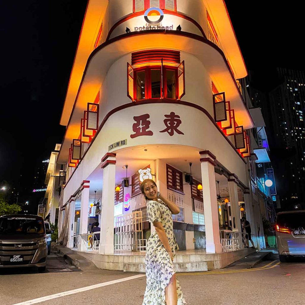 Girl posing in front of Potato Head - Instagrammable spots in Singapore