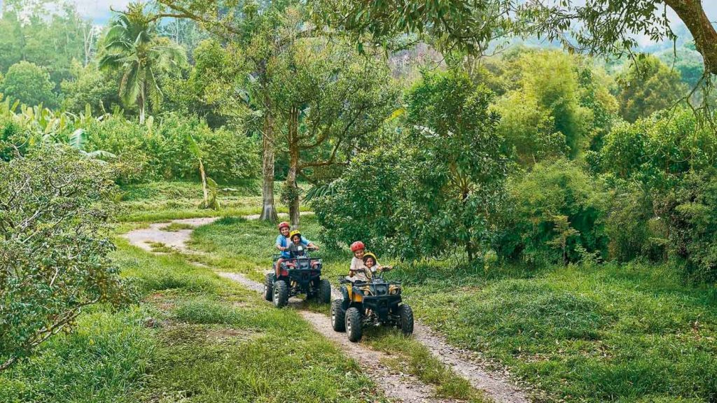 People riding ATV - Desaru Coast