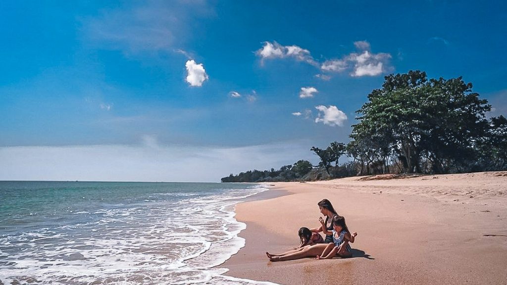 People sitting on beach - Desaru Coast