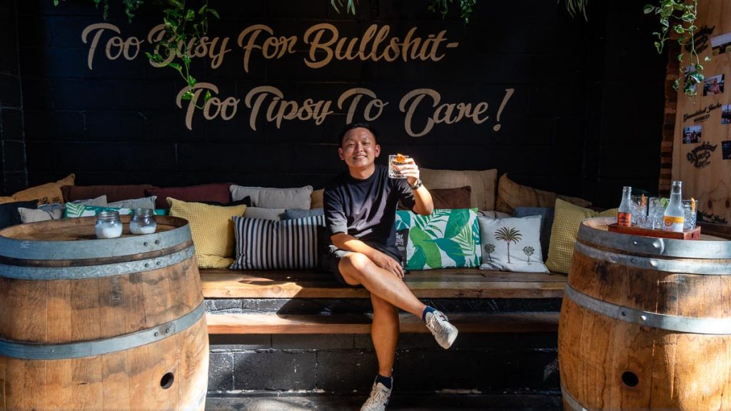 Man Holding a Cocktail - Things to do in Gold Coast