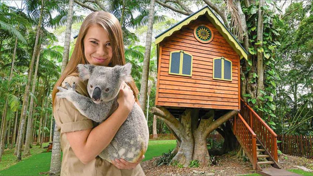 Girl Hugging Koala - Queensland Travel Guide