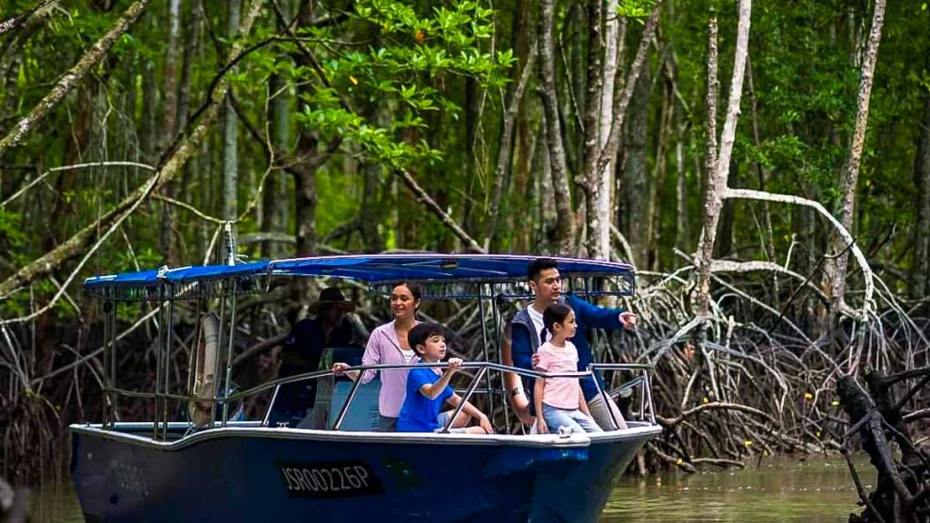 Family sitting on a boat - Desaru Coast