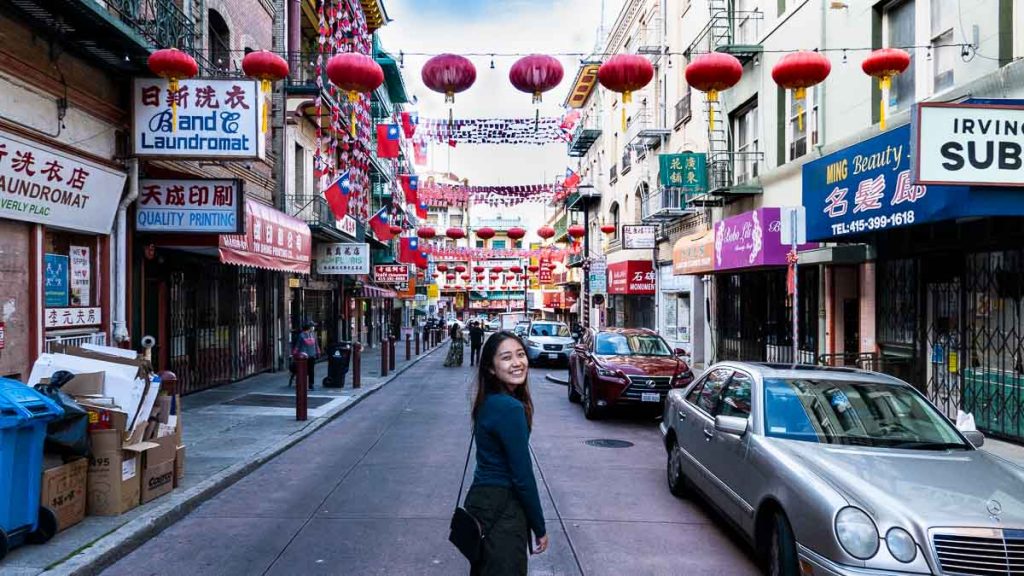 Girl posing in front of laterns at Chinatown - San Francisco Itinerary