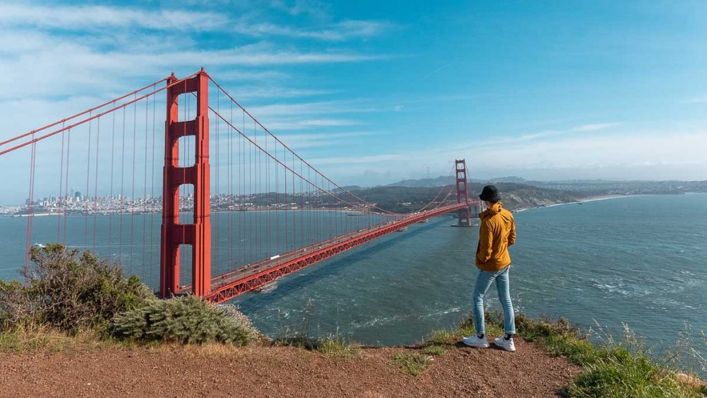 Guy standing by Battery Spencer Golden Gate Bridge - Day Trips from San Francisco