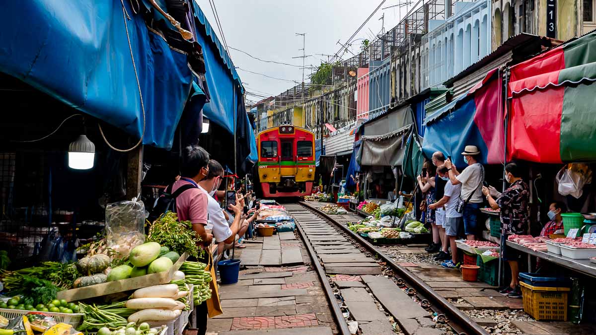 Maeklong Railway Market Train Entering - Bangkok Itinerary