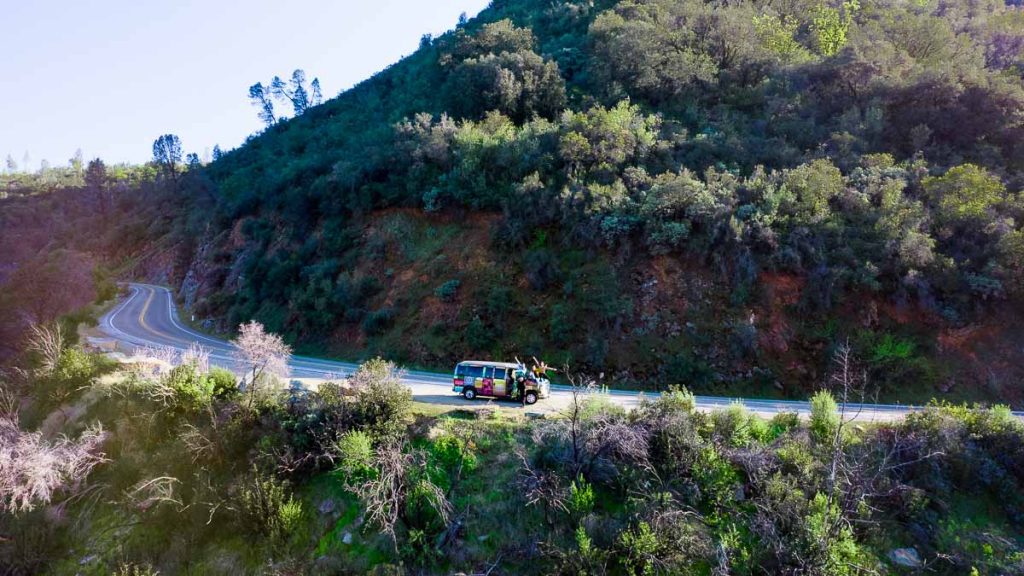 People sitting on top of campervan to Yosemite- San Francisco Itinerary